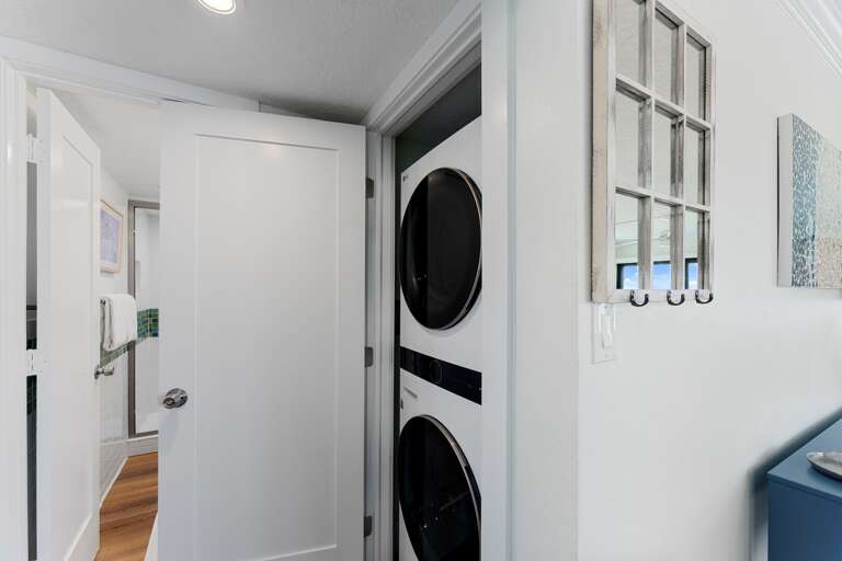 Enjoy the convenience of a full-sized washer and dryer located inside the condo, ensuring you have everything you need for a relaxing and comfortable stay