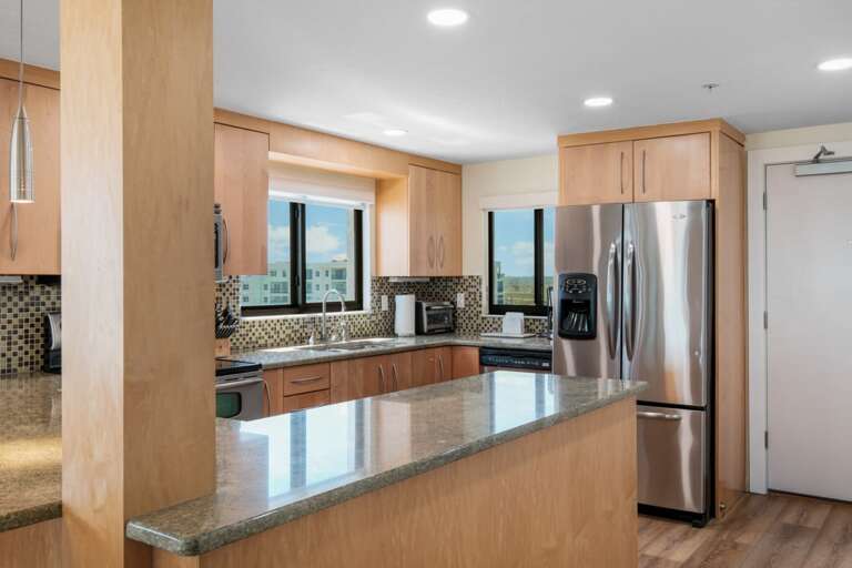 The fully equipped kitchen includes everything from modern appliances to cookware, giving you the perfect space to prepare meals