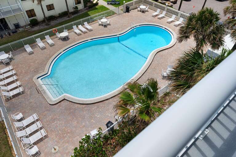 Along with stunning beach views, the corner wrap-around balcony offers an unobstructed view of the Shorehom by the Sea pool