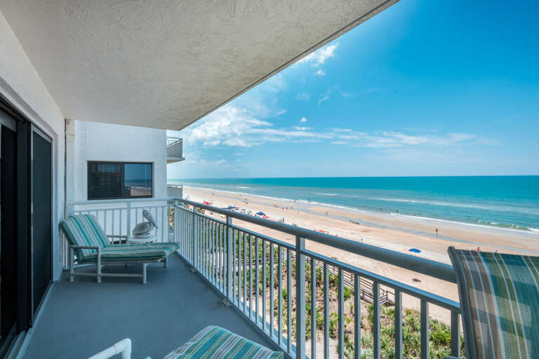 The balcony furniture is perfect for relaxing and taking in the beautiful beach view The balcony furniture is perfect for relaxing and taking in the beautiful beach view