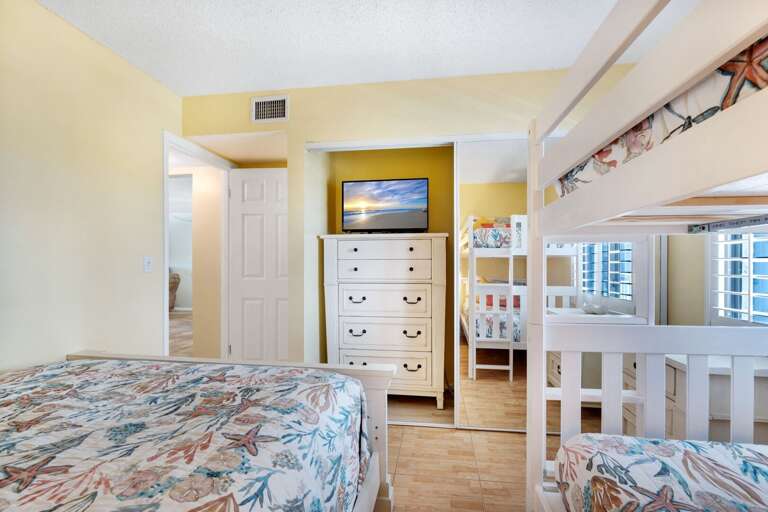 The guest bedroom also has a TV The guest bedroom also has a TV