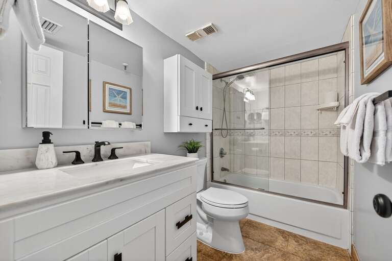 The master bathroom has an updated glass and tile shower The master bathroom has an updated glass and tile shower