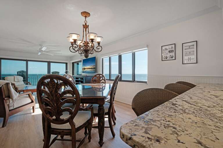 Take in breathtaking Atlantic Ocean views from the sunny, south-facing corner window and the expansive oceanfront sliding glass doors—all from the comfort of your dining room table Take in breathtaking Atlantic Ocean views from the sunny, south-facing corner window and the expansive oceanfront sliding glass doors—all from the comfort of your dining room table