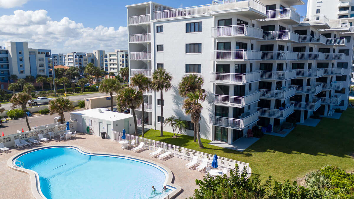 Take a dip in the heated pool at Shorehom by the Sea, where you can relax at poolside tables and chairs, with convenient bathrooms available on the deck Take a dip in the heated pool at Shorehom by the Sea, where you can relax at poolside tables and chairs, with convenient bathrooms available on the deck