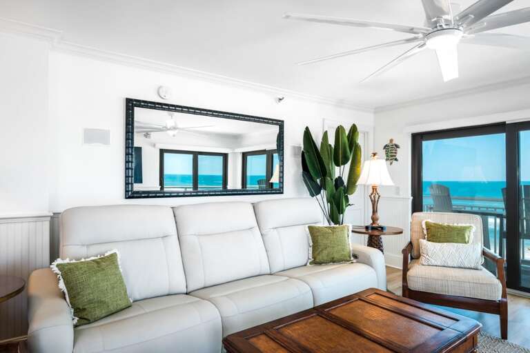Enjoy a zero-gravity reclining sofa and plenty of additional seating in the oceanfront living room, perfect for unwinding while taking in the breathtaking views