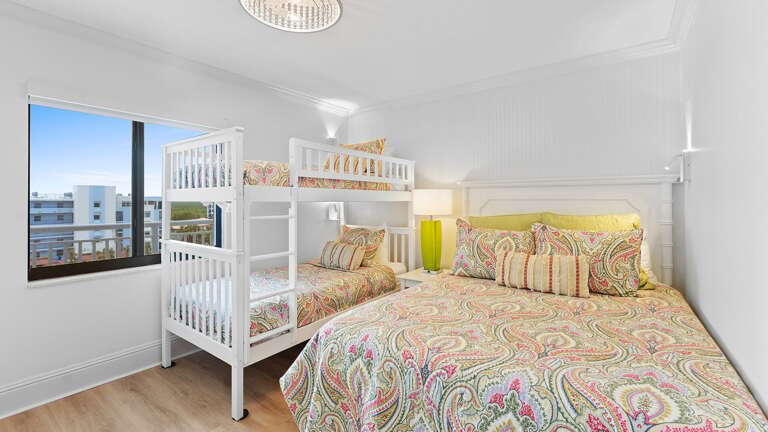 The guest bedroom queen bed and twin bunk provide comfortable sleeping arrangements for family and friends. Each bed has a wall mounted reading light with a convenient charging station The guest bedroom queen bed and twin bunk provide comfortable sleeping arrangements for family and friends. Each bed has a wall mounted reading light with a convenient charging station