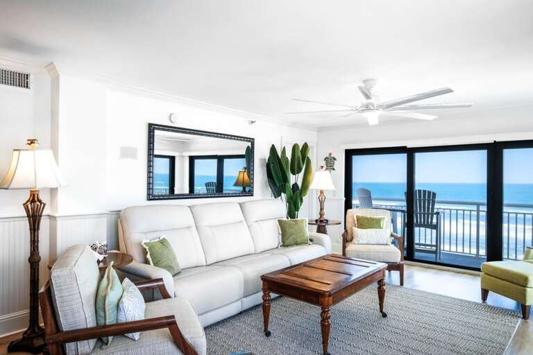Unwind on the comfortable zero-gravity reclining sofa in the living room, an ideal spot to enjoy the ocean views and your favorite shows Unwind on the comfortable zero-gravity reclining sofa in the living room, an ideal spot to enjoy the ocean views and your favorite shows