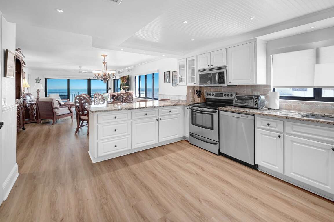 The updated kitchen features stainless steel appliances and is fully equipped with everything you need to cook during your vacation—plus, you'll enjoy a stunning ocean view as a bonus The updated kitchen features stainless steel appliances and is fully equipped with everything you need to cook during your vacation—plus, you'll enjoy a stunning ocean view as a bonus