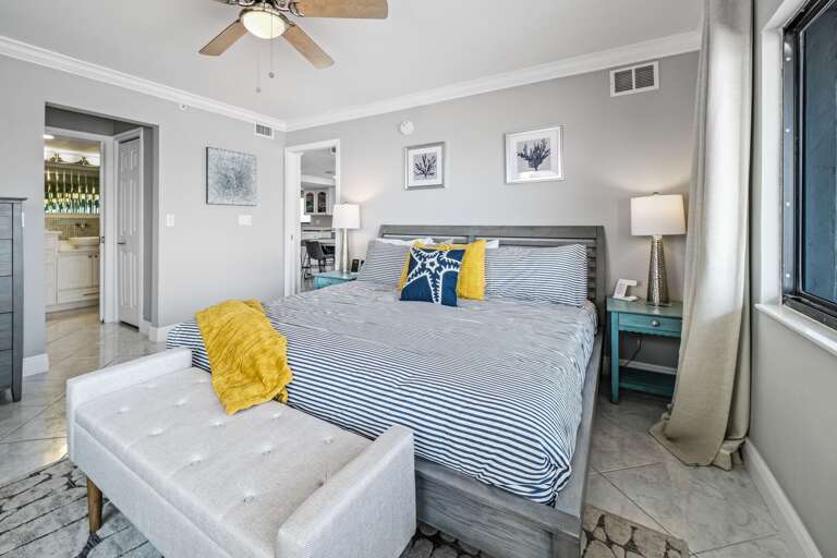 Master bedroom with a king bed and an ensuite bathroom