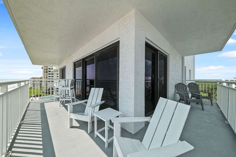 This north-facing corner condo has a large wrap around balcony with plenty of seating to take in the view
