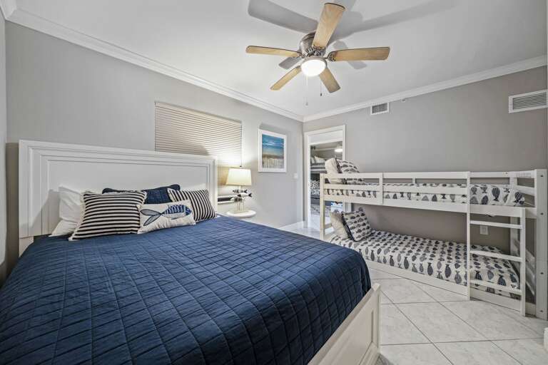 Sleep 4 in the guest bedroom with a queen bed and twin bunk bed