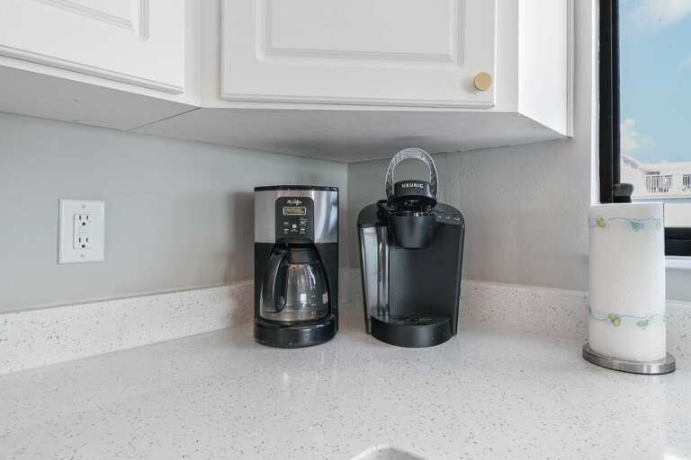 A standard drip coffee maker and a Keurig coffee maker are provided in the kitchen