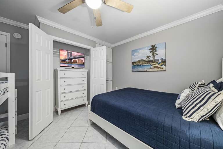 TV and dresser in the guest bedroom