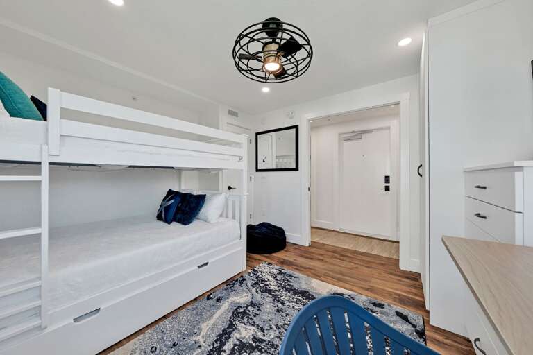 Full over full bunk bed with a bonus trundle bed in the guest bedroom