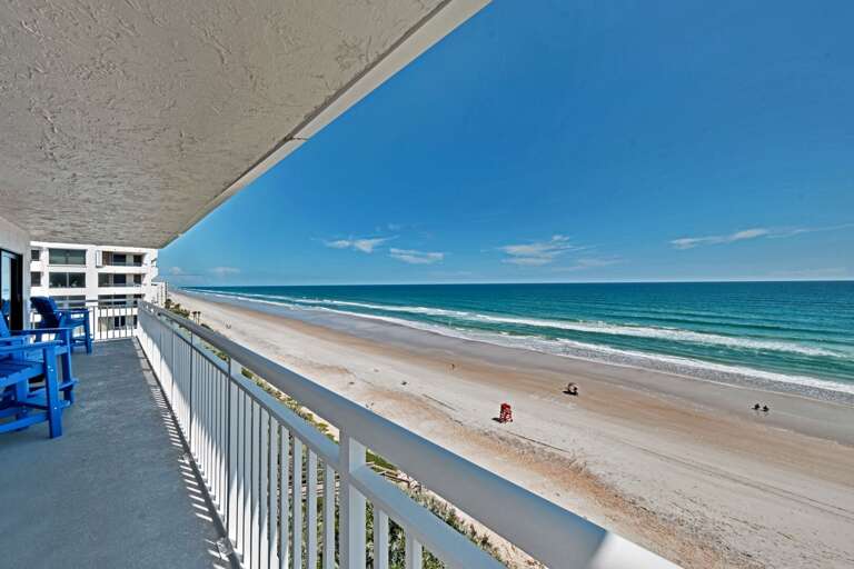 The large, 7th floor balcony provides a stunning view of no-drive New Smyrna Beach