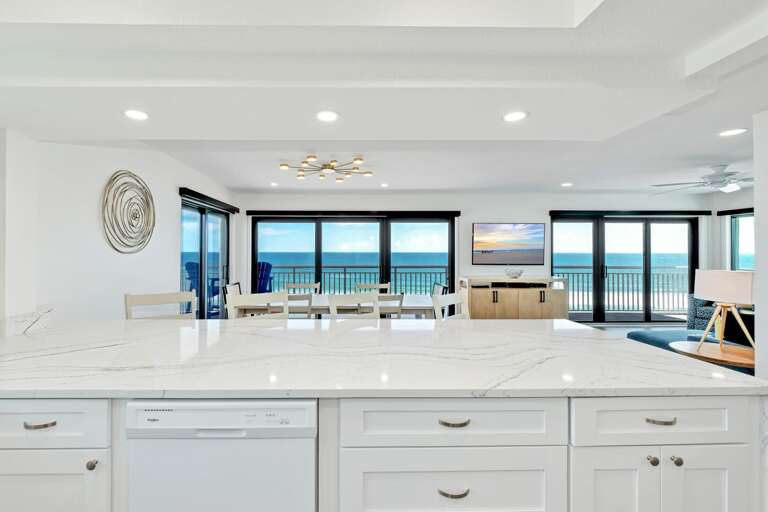 Wow! Soak in the beauty of New Smyrna Beach while cooking in the fully-equipped kitchen