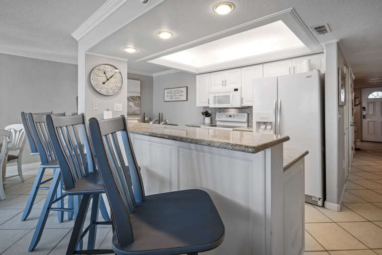 Additional seating for your group with 4 bonus barstools at the kitchen counter
