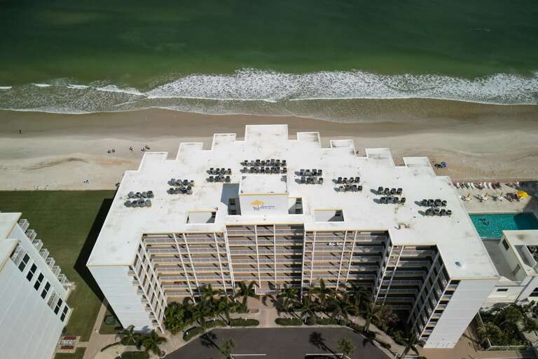 Smyrna Beach Club is a direct oceanfront property located on the peaceful, no-drive New Smyrna Beach, offering easy beach access and stunning ocean views