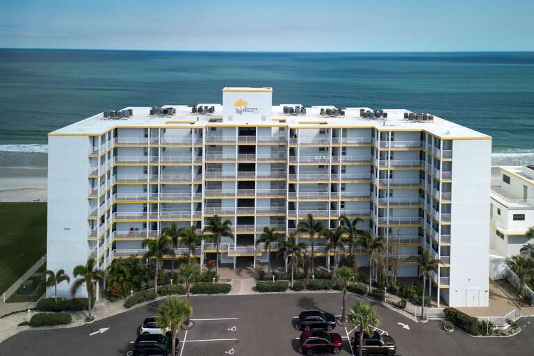 Smyrna Beach Club is a direct oceanfront property in New Smyrna Beach, offering stunning ocean views and easy access to the beautiful beach