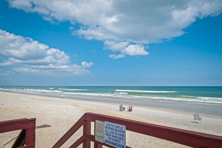 Enjoy convenient beach access at Smyrna Beach Club, where you're just steps away from the pristine sands and sparkling waters of New Smyrna Beach