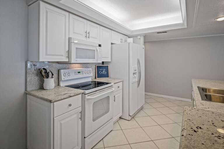 The kitchen has everything you need to cook your favorite meals while enjoying your New Smyrna Beach vacation