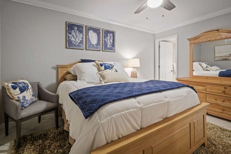 The master bedroom features a comfortable queen bed and a private ensuite bathroom