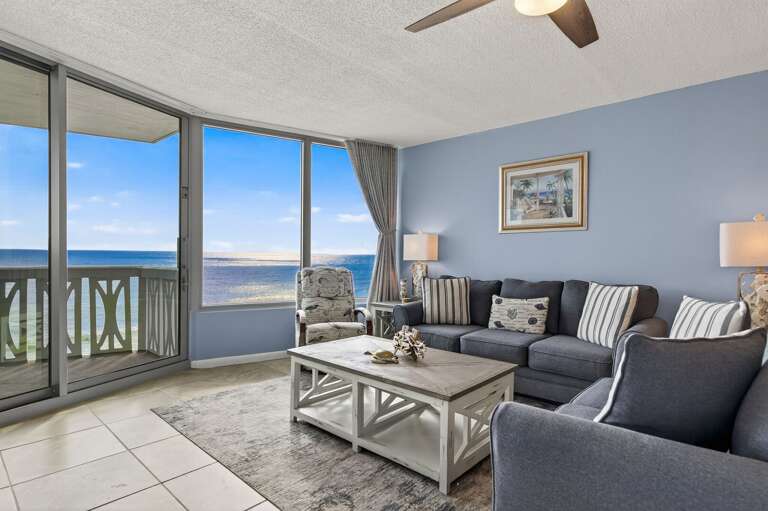 Kick back in style with panoramic beachfront views and breezy, open-concept living! Kick back in style with panoramic beachfront views and breezy, open-concept living!