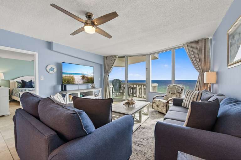 Relax in the bright, direct oceanfront living room with easy to your private beachfront balcony. Relax in the bright, direct oceanfront living room with easy to your private beachfront balcony.