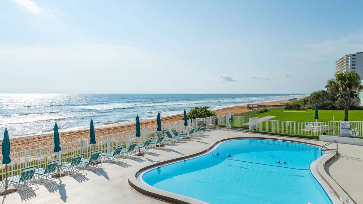 Soak up the sun at Surfside Club South's oceanfront pool deck – the perfect spot to relax and recharge! Soak up the sun at Surfside Club South's oceanfront pool deck – the perfect spot to relax and recharge!