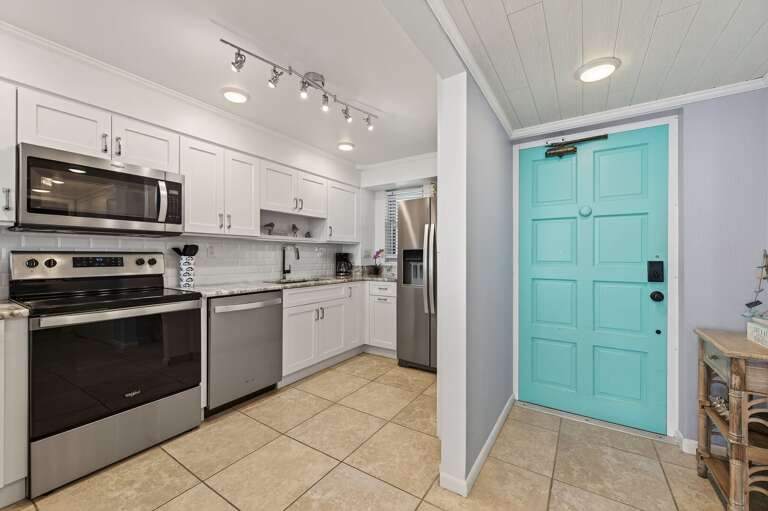 Whip up meals with ease in this bright, beachy kitchen complete with sleek stainless steel appliances! Whip up meals with ease in this bright, beachy kitchen complete with sleek stainless steel appliances!