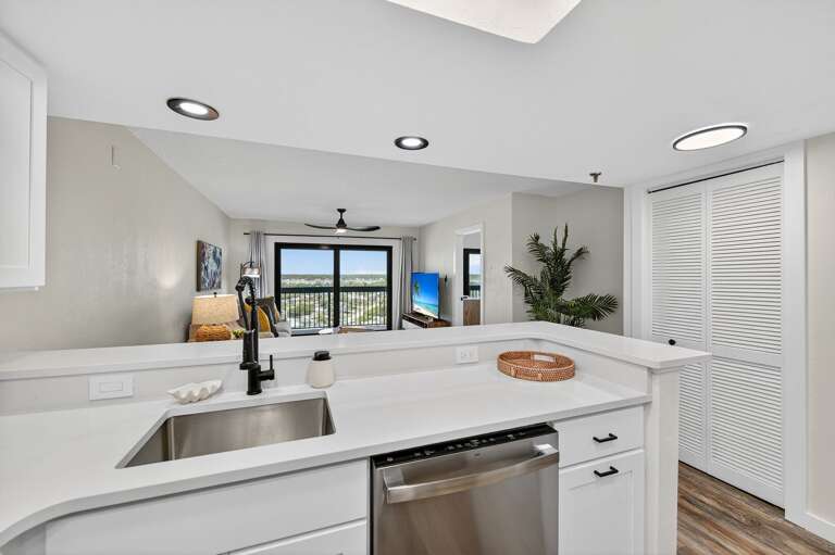 Cook and connect in the open, updated kitchen designed for modern convenience Cook and connect in the open, updated kitchen designed for modern convenience