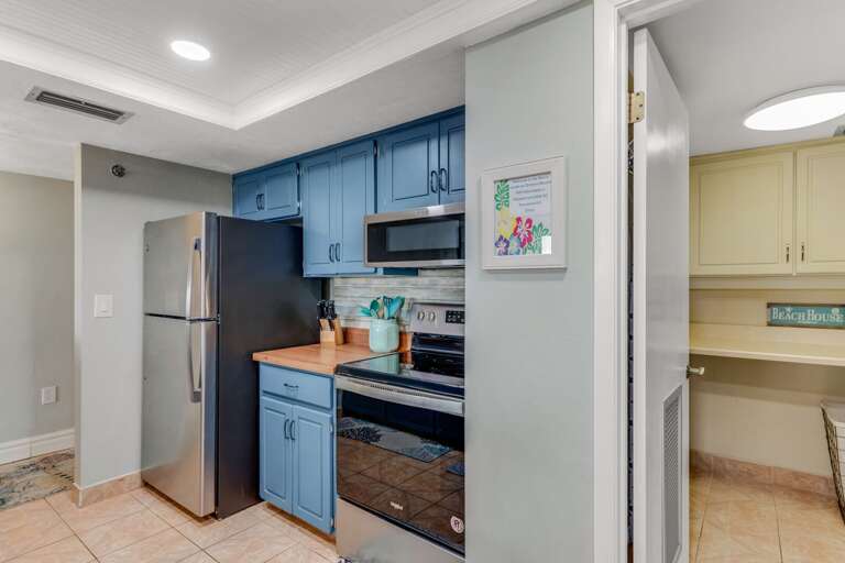 The laundry room is conveniently located just off the kitchen, making laundry easy during your stay The laundry room is conveniently located just off the kitchen, making laundry easy during your stay