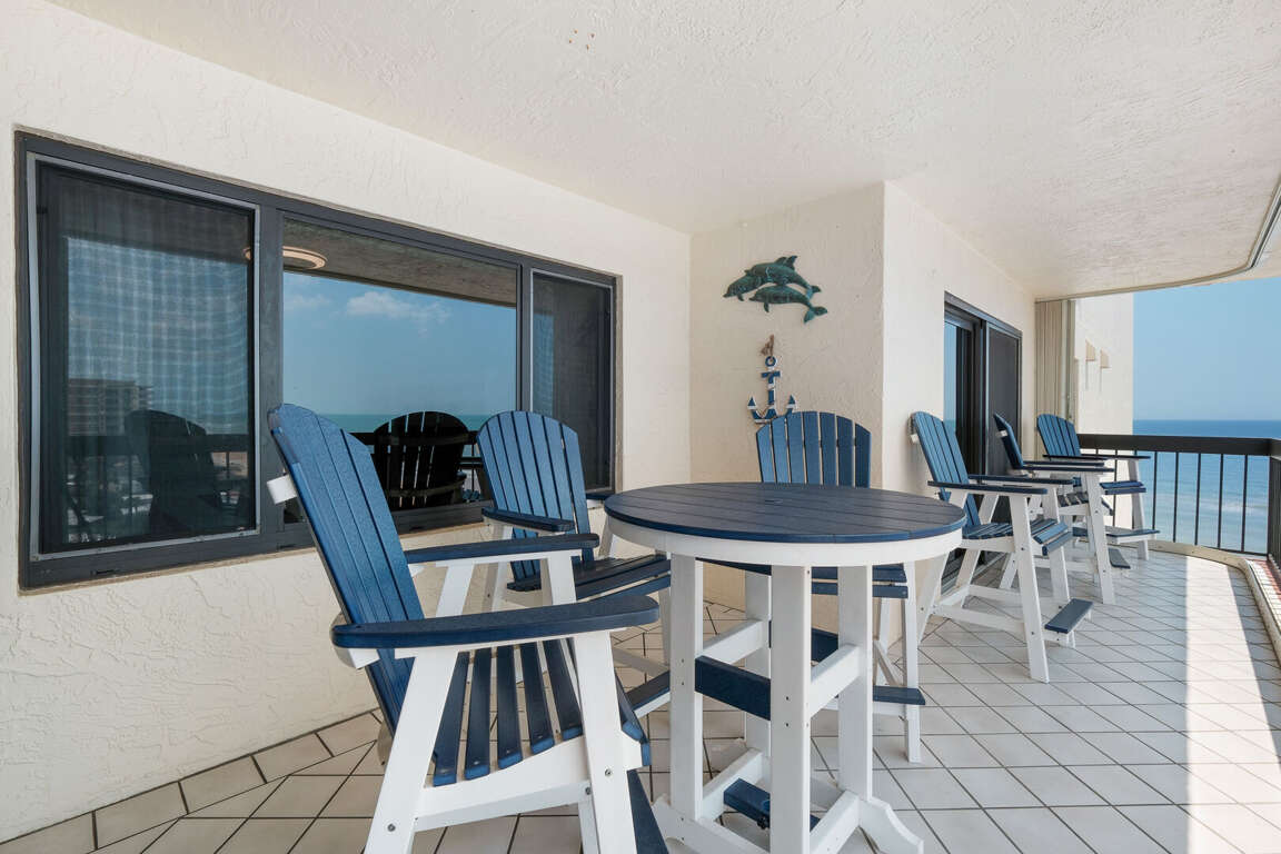 Balcony furniture provides a spectacular view of Ormond Beach and Atlantic Ocean waves Balcony furniture provides a spectacular view of Ormond Beach and Atlantic Ocean waves