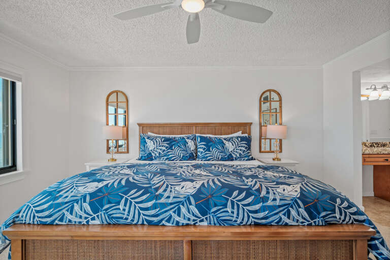 Comfortable king bed with fresh linens in the master bedroom