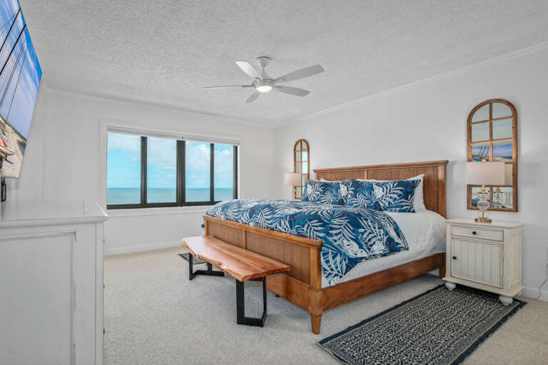 King bed with fresh, clean linens in the master suite