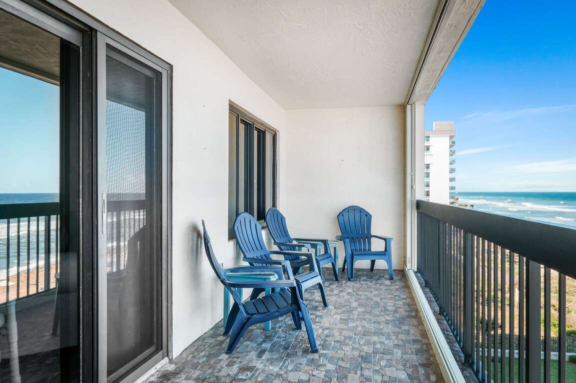 Enjoy plenty of comfortable seating on the private 4th-floor balcony, perfect for soaking in ocean views and coastal breezes Enjoy plenty of comfortable seating on the private 4th-floor balcony, perfect for soaking in ocean views and coastal breezes