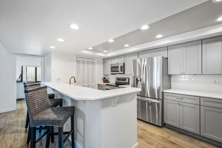 Extra seating at the kitchen counter with 3 bonus bar stools—perfect for quick breakfasts or casual conversation while cooking Extra seating at the kitchen counter with 3 bonus bar stools—perfect for quick breakfasts or casual conversation while cooking