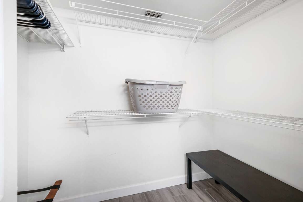 The huge master bedroom closet has plenty of space for your luggage, clothing, and more! The huge master bedroom closet has plenty of space for your luggage, clothing, and more!