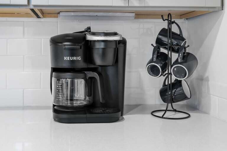 The kitchen has a standard drip and a Keurig coffee maker The kitchen has a standard drip and a Keurig coffee maker