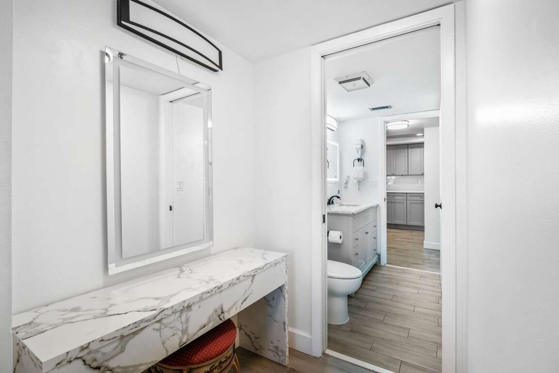 The north guest bathroom also has multiple vanities and an anti-fog mirror The north guest bathroom also has multiple vanities and an anti-fog mirror