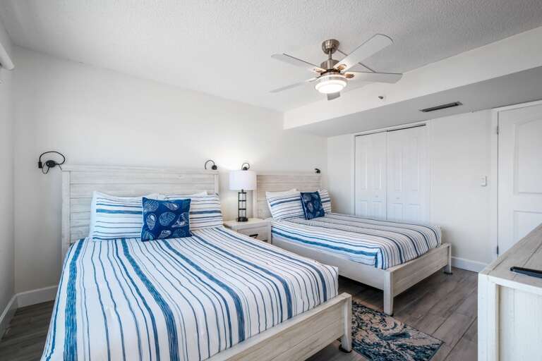 The south guest bedroom also has two queen beds and an ensuite bathroom The south guest bedroom also has two queen beds and an ensuite bathroom