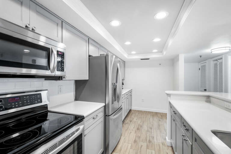 The updated kitchen is fully-equipped with everything you need to cook while on your vacay The updated kitchen is fully-equipped with everything you need to cook while on your vacay