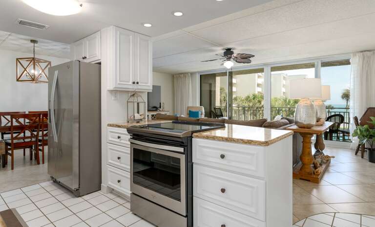 Cook meals with an ocean view in this fully equipped kitchen Cook meals with an ocean view in this fully equipped kitchen