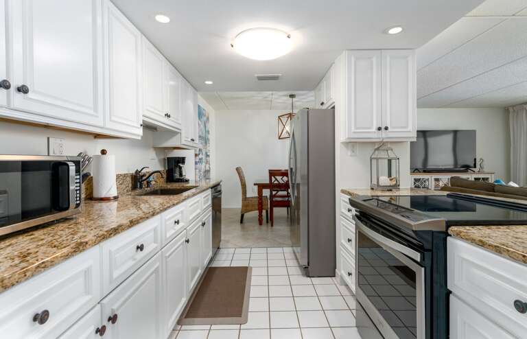 Cook like a pro in the updated kitchen, fully equipped with everything you need to prepare meals during your vacation Cook like a pro in the updated kitchen, fully equipped with everything you need to prepare meals during your vacation