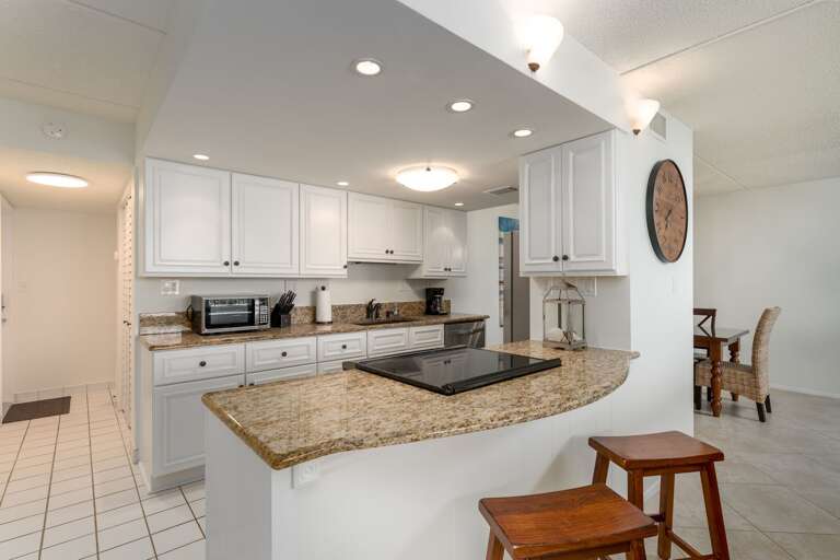 Cook in style in the updated kitchen, complete with sleek granite countertops Cook in style in the updated kitchen, complete with sleek granite countertops