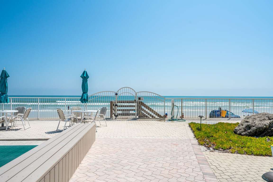 Enjoy the convenience of private Pelican beach access, just steps from your door for endless New Smyrna Beach fun Enjoy the convenience of private Pelican beach access, just steps from your door for endless New Smyrna Beach fun
