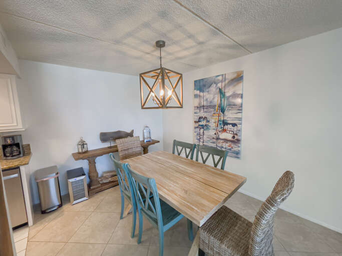 Gather in the dining room, featuring modern finishes that create a stylish and inviting space for meals and memories Gather in the dining room, featuring modern finishes that create a stylish and inviting space for meals and memories