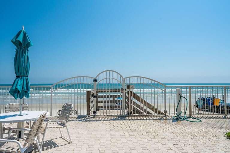 The Pelican offers private beach access to New Smyrna Beach, complete with a convenient sand rinse station to clean off after a day in the sun The Pelican offers private beach access to New Smyrna Beach, complete with a convenient sand rinse station to clean off after a day in the sun