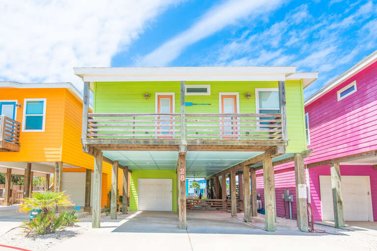 Colorful Beach Houses On Stilts Colorful Beach Houses On Stilts