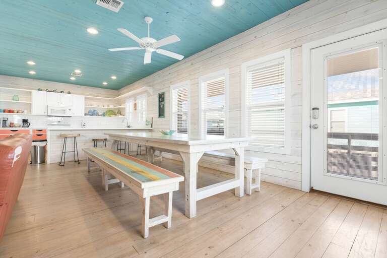 Interior Dining Area With Wooden Floors And Ceiling Fan